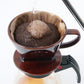 kalita style brown ceramic dripper brewing coffee